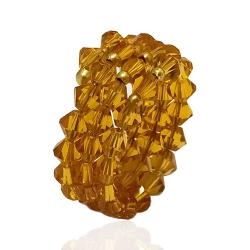 Anello a serpente con cristalli Swarovski Topaz mm 4 e inserti in oro giallo 18 carati