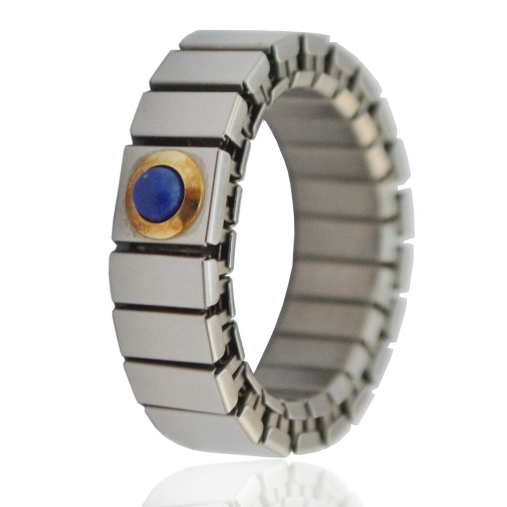 Anello fascia pollice in acciaio maglia estensibile ed oro 18 carati titolo 750 con particolare in lapislazzuli