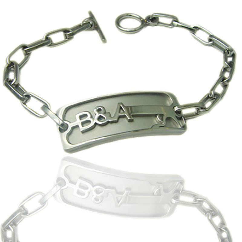 Bracciale donna baci&abbracci in acciaio satinato con targa e chiusura a t
