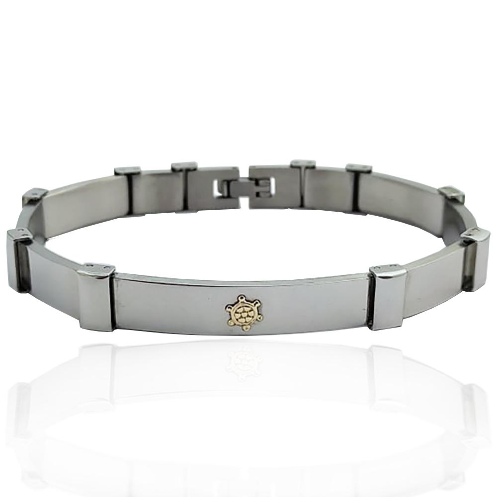 Bracciale in acciaio lucido cm 20 a segmenti con applicazioni in oro giallo 18k timone e borchie