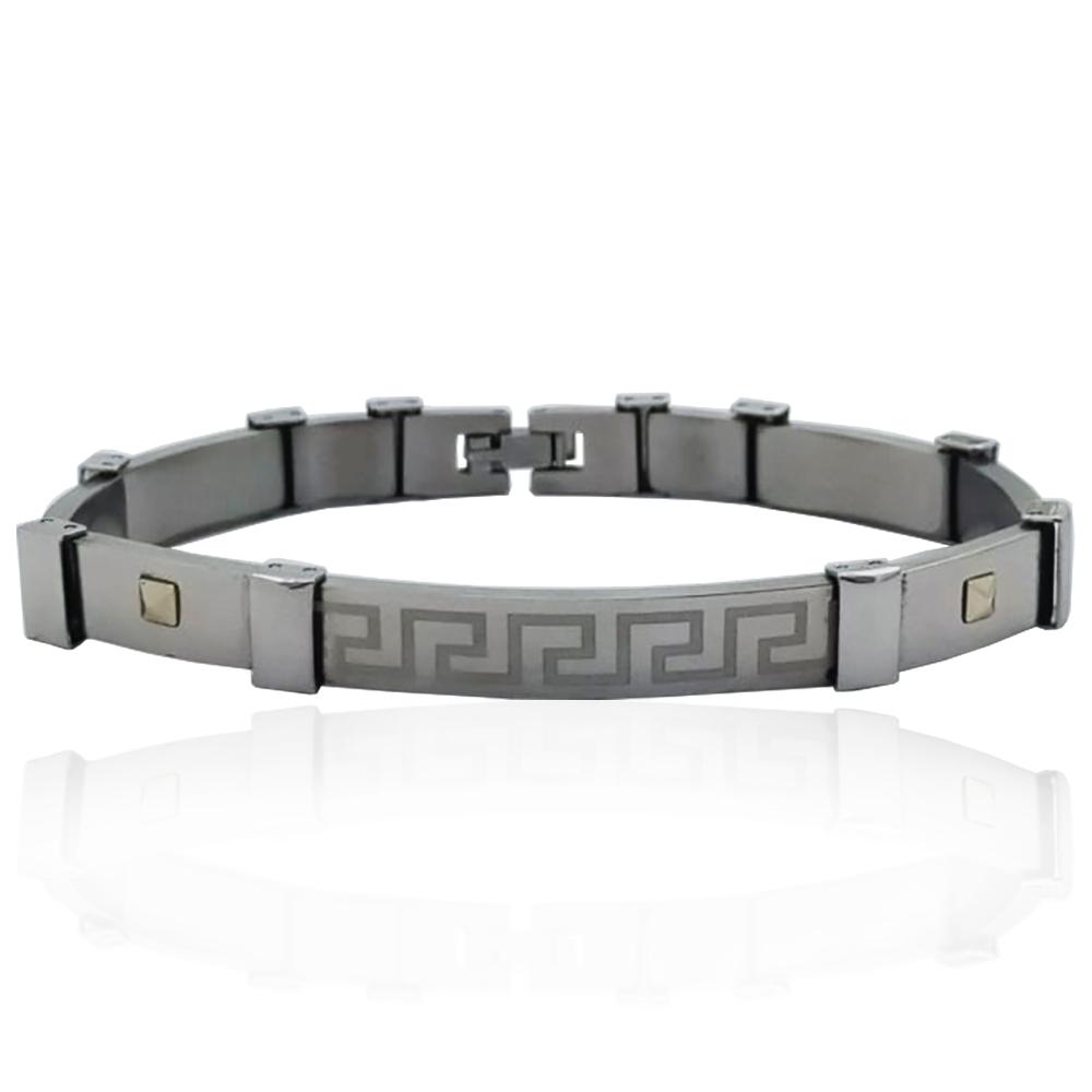 Bracciale in acciaio lucido mm 8 con targa centrale con greca laserata e con applicazioni in oro giallo 18k