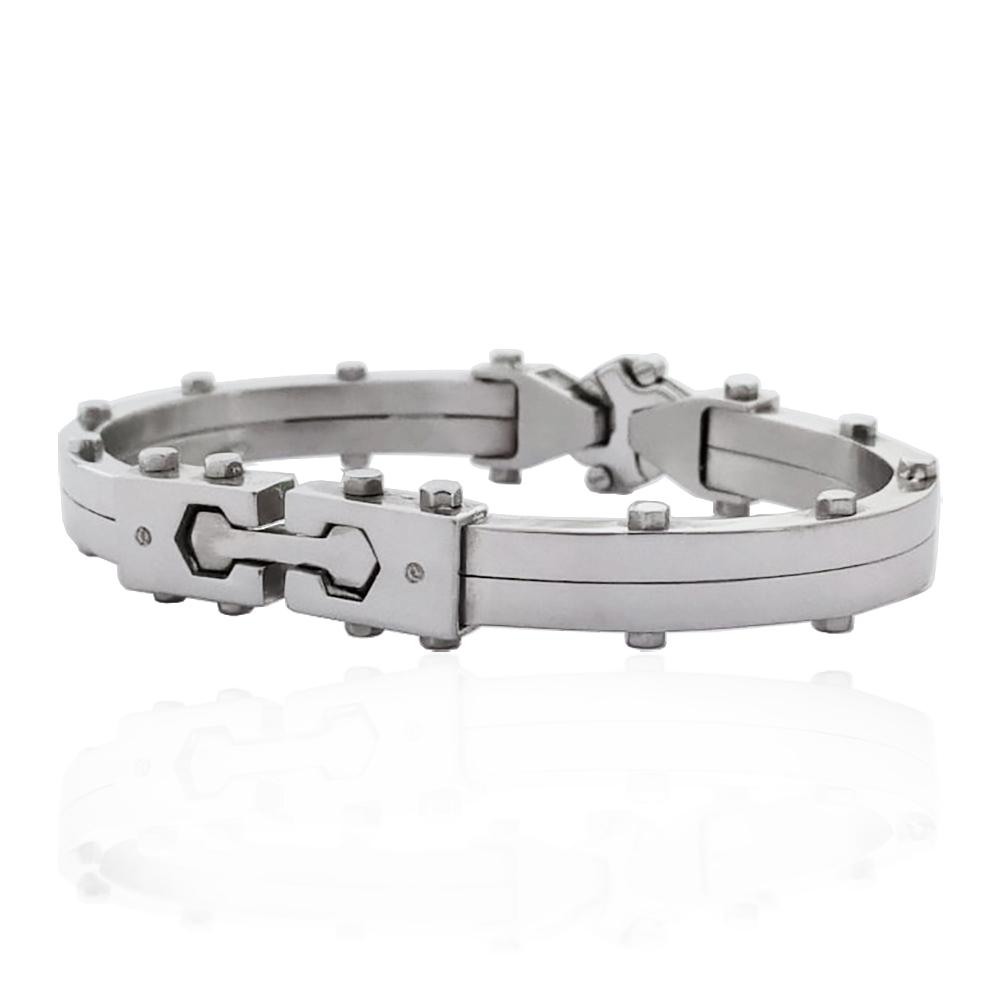 Bracciale uomo rigido in acciaio lucido con diamanti naturali ct. 0,02 e borchie esterne