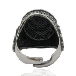 Anello tondo mm 20 in argento 925 brunito con decoro giglio e pietra blu