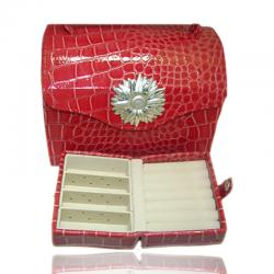Borsa beauty portagioie in pelle rossa con margherita centrale laminata argento