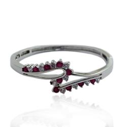 Bracciale rigido alla schiava in metallo argentato con zirconi bianchi e rosso violaceo